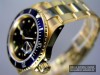 ROLEX Submariner in 18K. Gelbgold