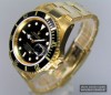 Rolex Submariner in 18 K. Gelbgold